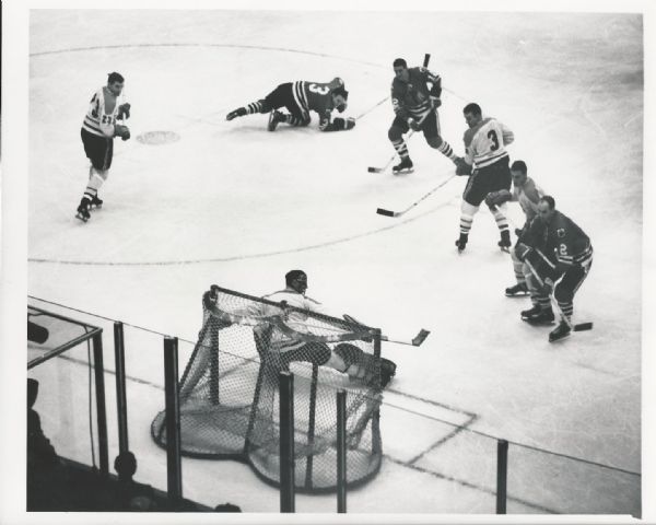 Jacques Plante surrounded by Hawks and Canadiens with Pilote original 1962 photo