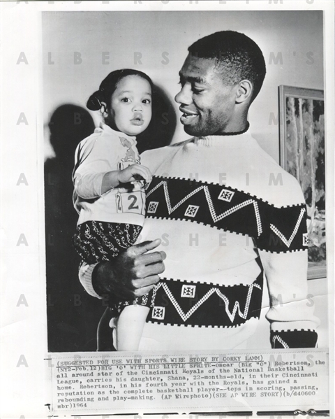 “The Big O” Oscar Robertson with infant daughter 1964 AP photo - Adorable