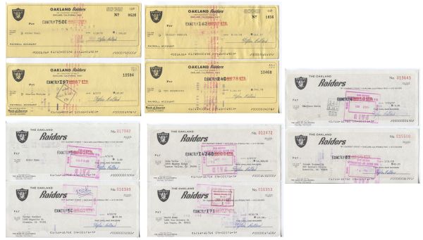 Lot of 10 Oakland Raiders signed payroll player checks