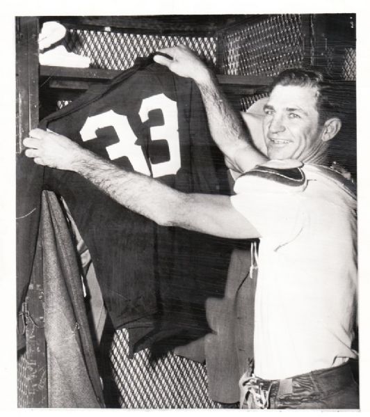 Sammy Baugh hanging up his jersey for the final time 1952 Redskins original photo